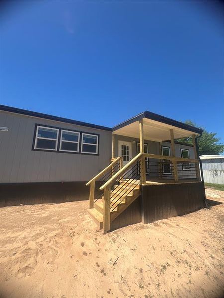 Exterior details and patio area of a home in , Pelican Bay (Image 16).