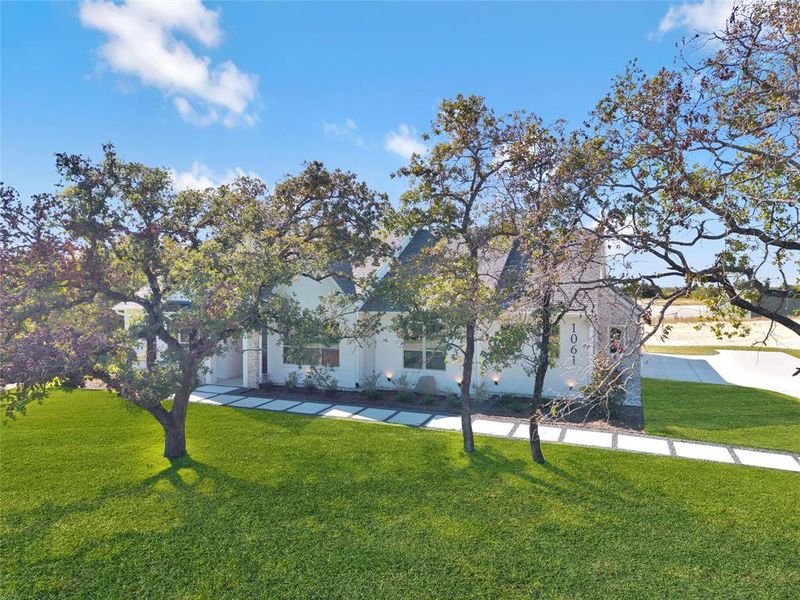 Exterior details and patio area of a home in , Azle (Image 25). Exterior details and patio area of a home in , Azle (Image 25).
