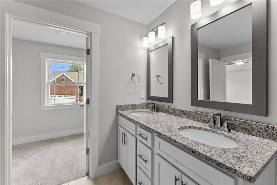Representative furnished interior of a home built from the Emilia Elite by Enchanted Homes in Pointe Summit, Slater-Marietta (Image 20).