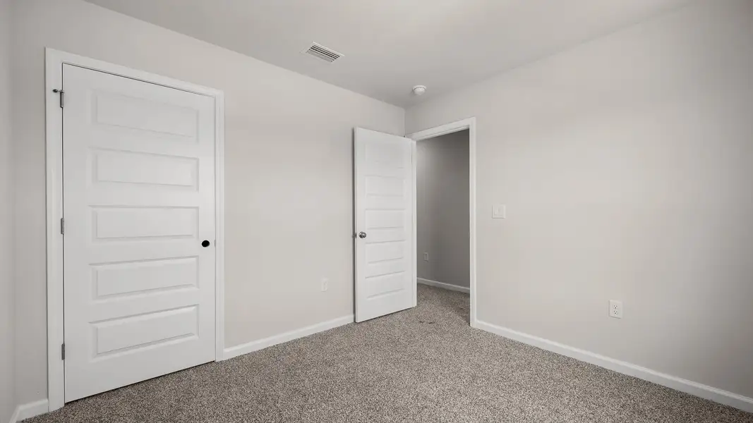 Representative unfurnished interior of a home built from the The Canmore by D.R. Horton in Salt Pines, Port Saint Joe (Image 29).