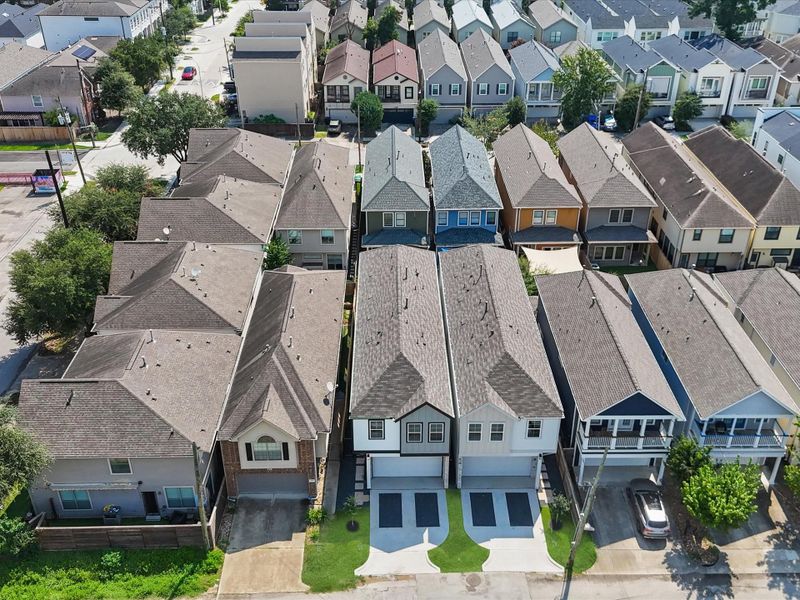 Aerial view of the Sunset Heights community in Houston, TX, showing layout and nearby surroundings (Image 1). Aerial view of the Sunset Heights community in Houston, TX, showing layout and nearby surroundings (Image 1).