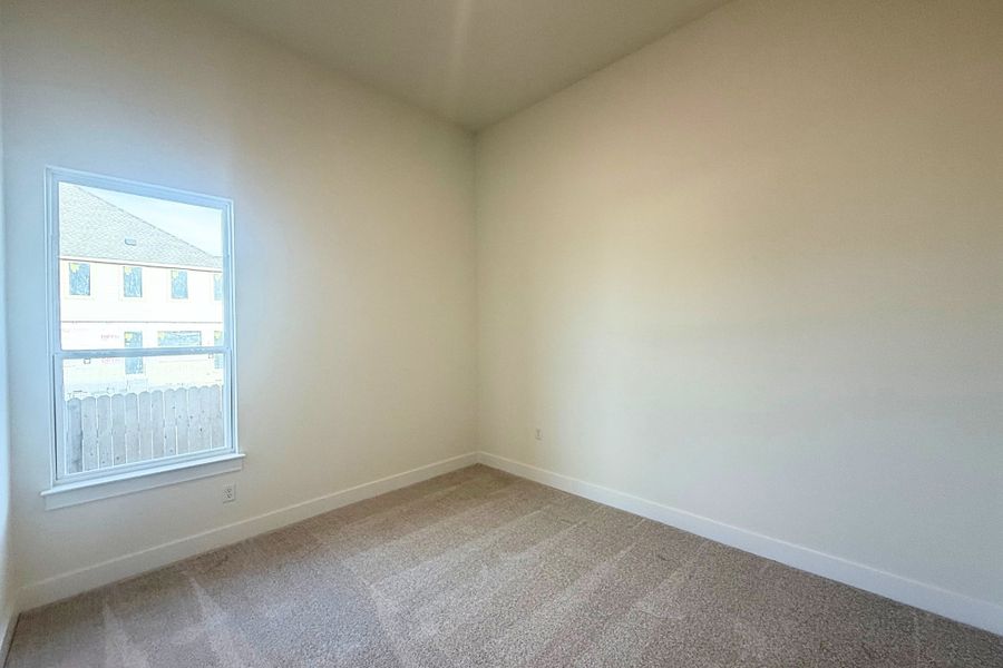 Spacious, unfurnished interior of a new home in The Grove at Blackhawk, Pflugerville (Image 27).
