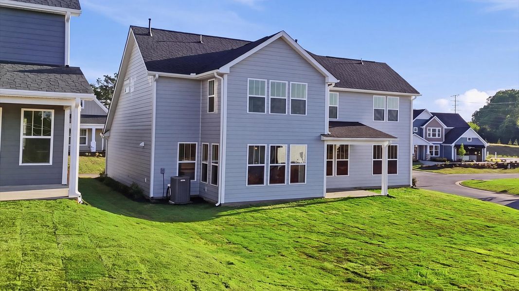 Exterior details and patio area of a home in Benjamin's Grove, Woodruff (Image 4).
