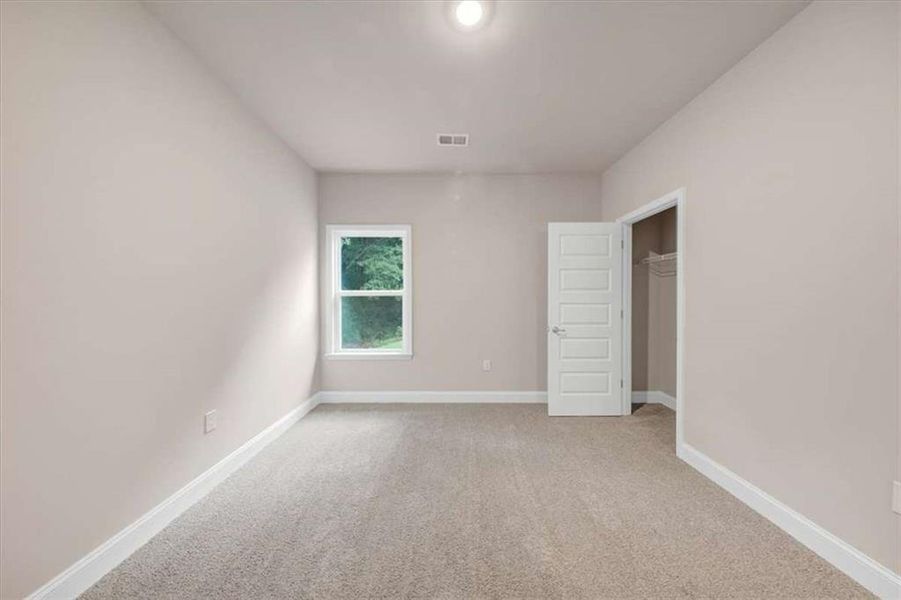 Spacious, unfurnished interior of a new home in Scarlett Place, Bowdon (Image 29).