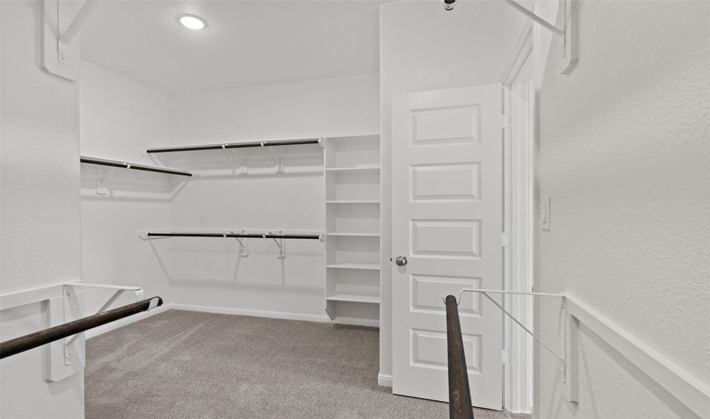 Large walk-in closet in owner's suite (*Photo not of actual home and used for illustration purposes only.) Large walk-in closet in owner's suite (*Photo not of actual home and used for illustration purposes only.)