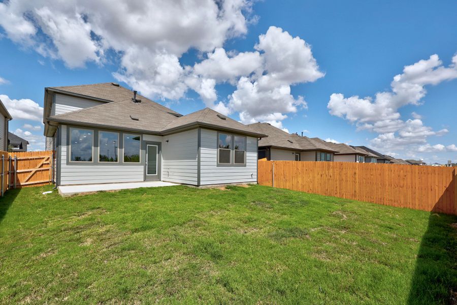 Exterior details and patio area of a home in Trinity Ranch, Elgin (Image 24).