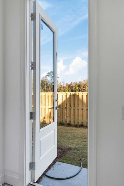 Exterior details and patio area of a home in , Johns Island (Image 3).