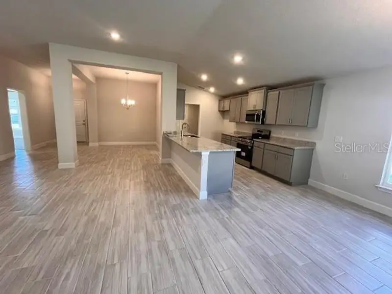 Furnished interior view inside a new home in Abbey Glen, Dade City (Image 4).