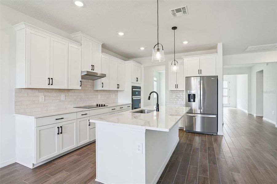Furnished interior view inside a new home in Two Rivers - Signature Series, Zephyrhills (Image 9). Furnished interior view inside a new home in Two Rivers - Signature Series, Zephyrhills (Image 9).
