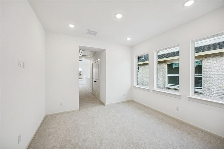 The upstairs game room makes a perfect secondary living space or playroom!