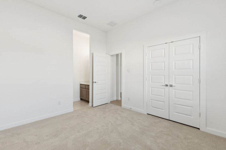 Bedroom in the Gilmour II home plan by Trophy Signature Homes – REPRESENTATIVE PHOTO Bedroom in the Gilmour II home plan by Trophy Signature Homes – REPRESENTATIVE PHOTO