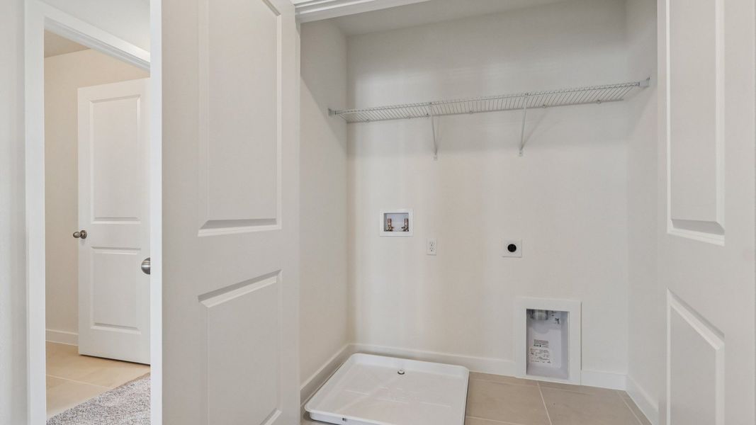 Furnished interior view inside a new home in Cyrene at Harmony, St. Cloud (Image 34).