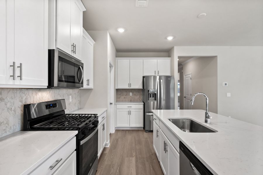 Furnished interior view inside a new home in Cypress Ridge - The Coastline Series, Longs (Image 6).