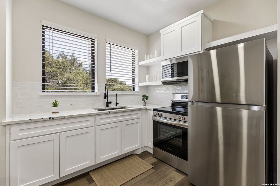 Furnished interior view inside a new home in , Leon Valley (Image 49).