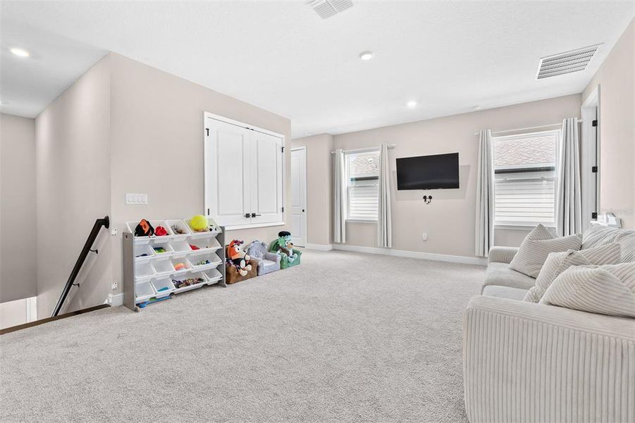 Furnished interior view inside a new home in Laureate Park, Orlando (Image 13).