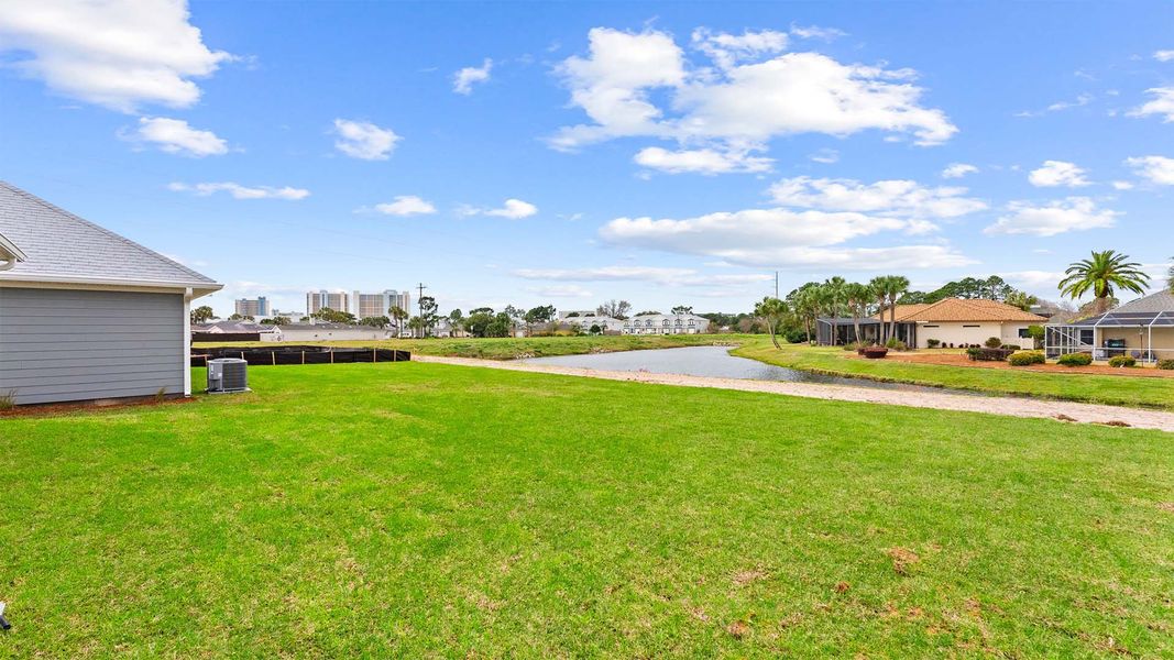 Exterior details and patio area of a home in Caballeros Estates At Hombre, Panama City Beach (Image 4).