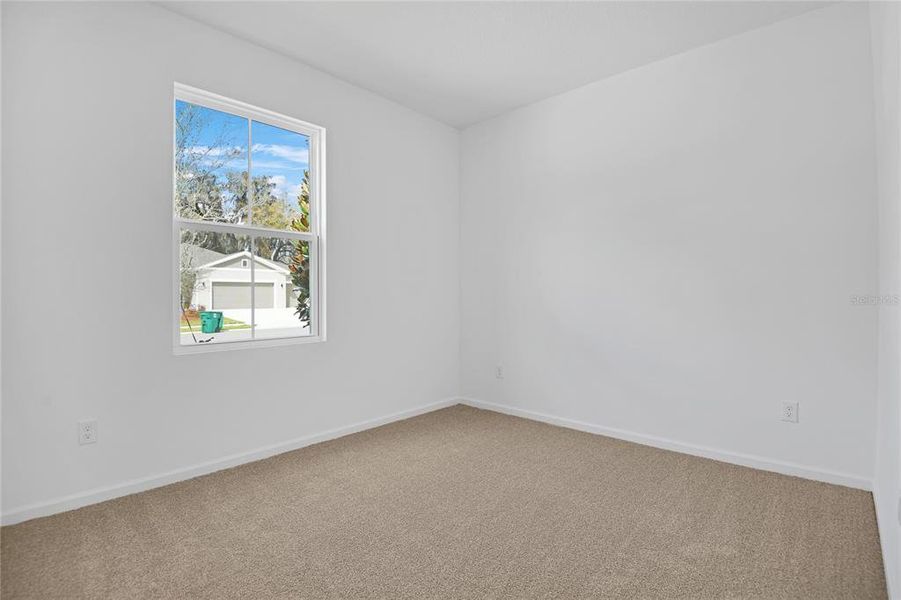 Spacious, unfurnished interior of a new home in Seasons at Grandview Gardens, Deland (Image 14).