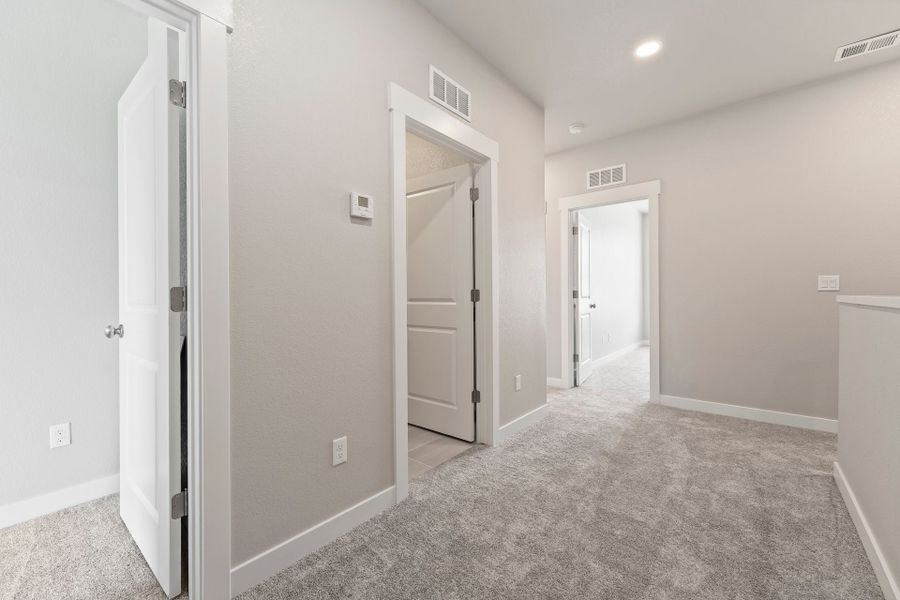 Spacious, unfurnished interior of a new home in The Lakes at Centerra, Loveland (Image 22). Spacious, unfurnished interior of a new home in The Lakes at Centerra, Loveland (Image 22).