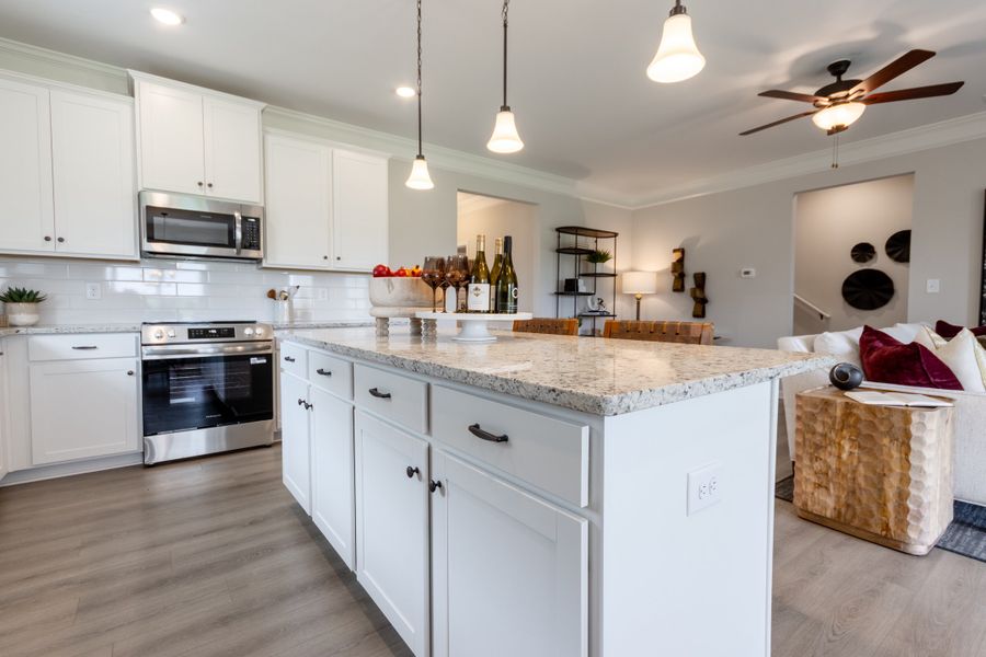 Bradley F with Bonus at Cobblestone Crossing Commons | Kitchen Island and Family Room Bradley F with Bonus at Cobblestone Crossing Commons | Kitchen Island and Family Room