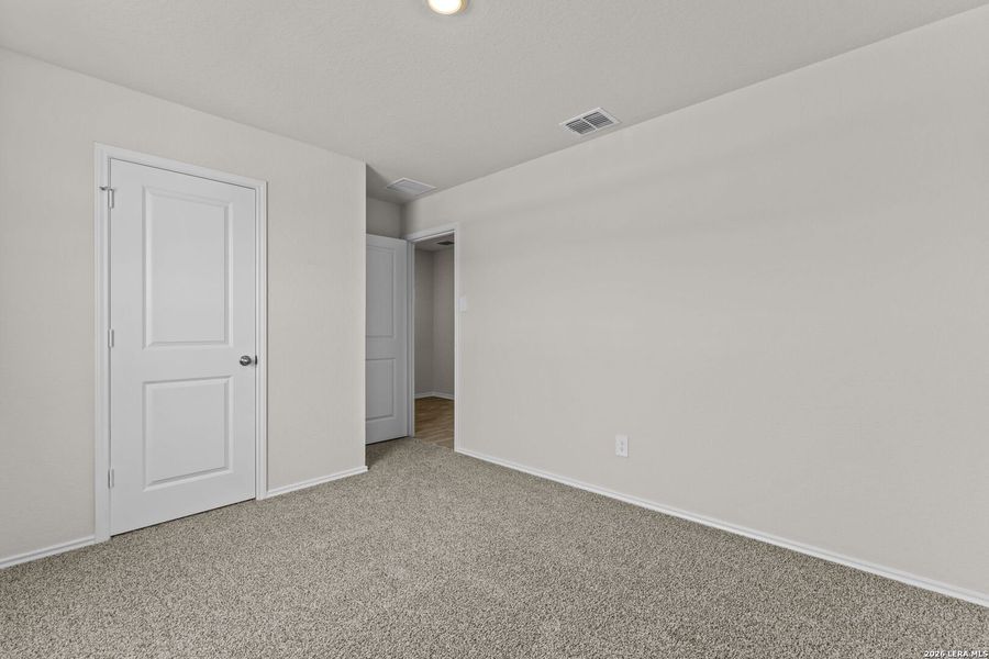 Spacious, unfurnished interior of a new home in Navarro Fields, Seguin (Image 20).