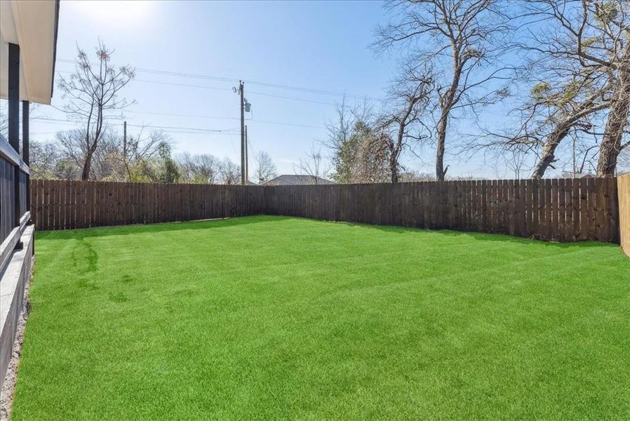 View of yard featuring a fenced backyard