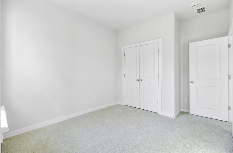 Spacious, unfurnished interior of a new home in Indigo Grove Townhomes, Johns Island (Image 24).
