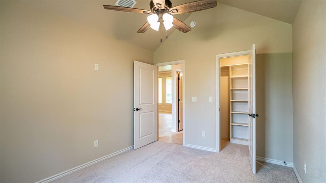 Secondary bedroom with walk in closet Secondary bedroom with walk in closet