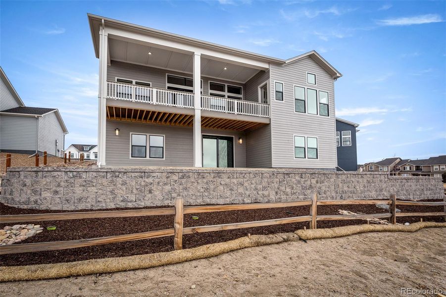 Exterior details and patio area of a home in Cloverleaf - Pinnacle Collection, Monument (Image 26).
