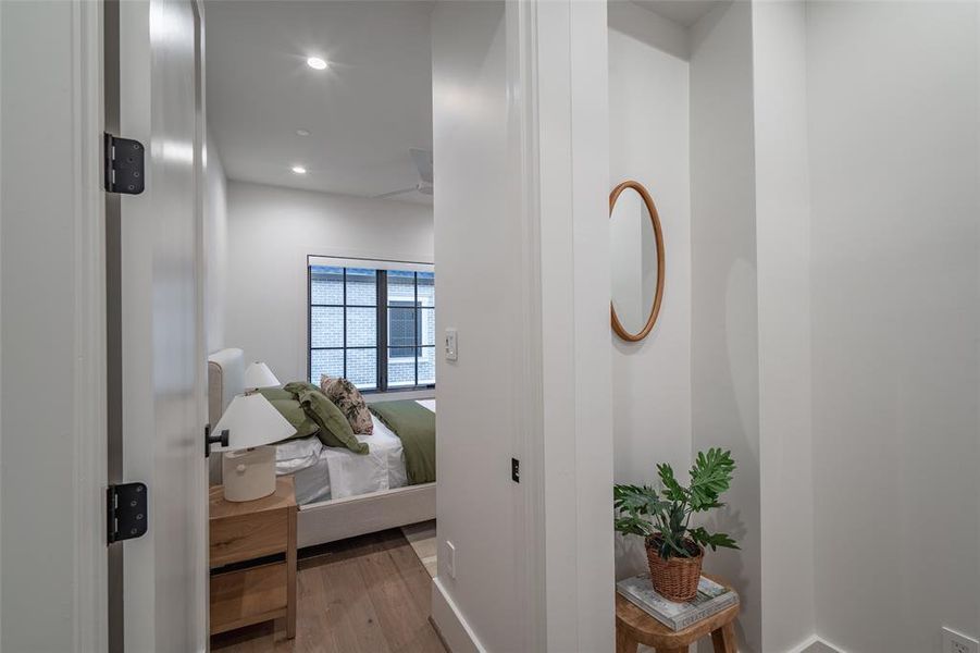 Corridor featuring light hardwood / wood-style flooring