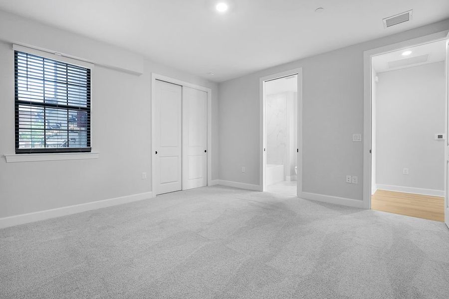 Spacious, unfurnished interior of a new home in Esplanade by the Islands Coach Homes, Naples (Image 11).