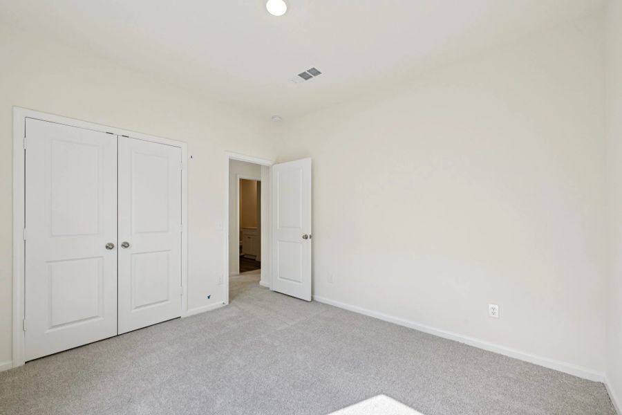 Representative unfurnished interior of a home built from the Glimmer by Starlight Homes in Cordova Trails, Seguin (Image 17).