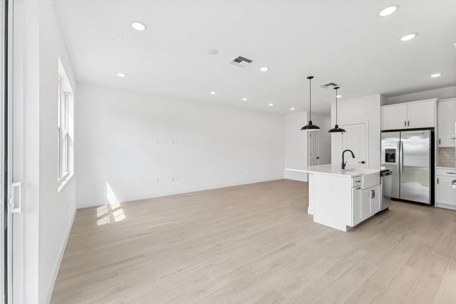 Kitchen, Great Room & Dining Area Kitchen, Great Room & Dining Area