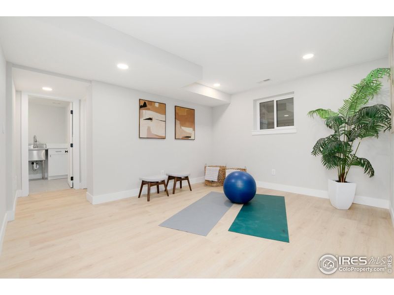 Thoughtful addition by the architect. This area can function as a home gym or a study area for children.