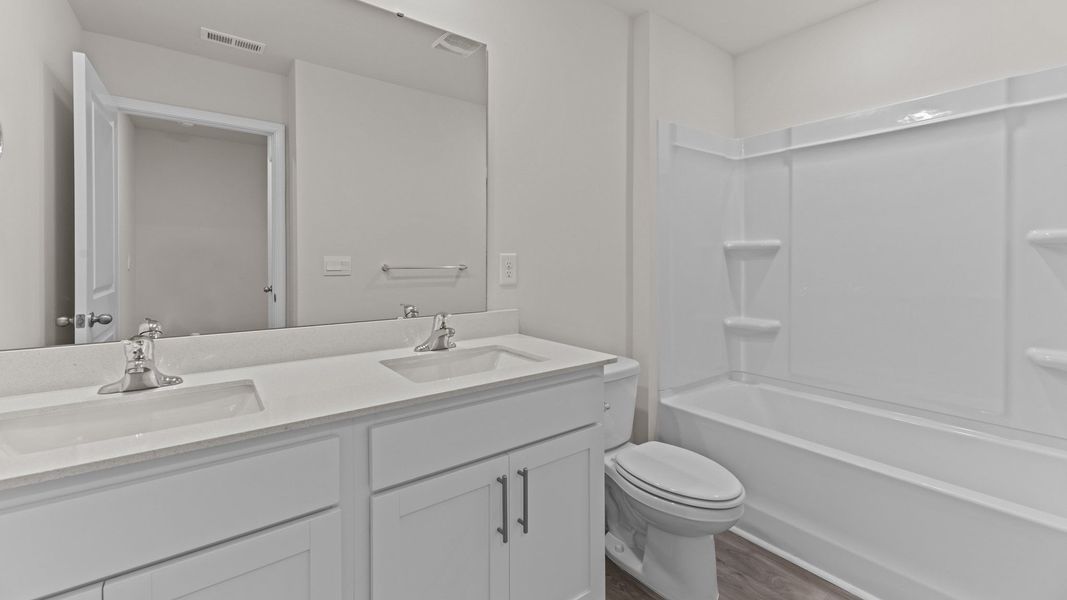 Furnished interior view inside a new home in Blair Ridge, La Grange (Image 8).