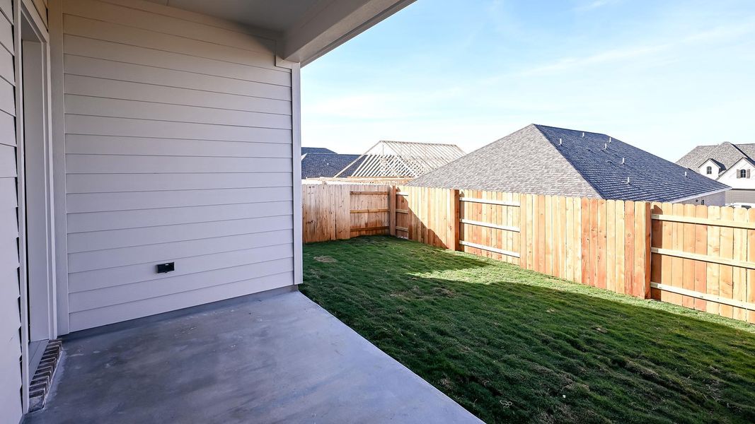 Exterior details and patio area of a home in Crosswinds, Kyle (Image 4).