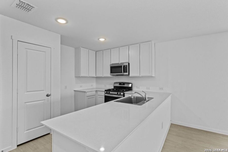 Furnished interior view inside a new home in Friendship Oaks, Fredericksburg (Image 7).