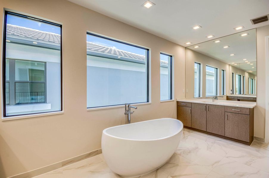 Furnished interior view inside a new home in Apex at Avenir, Palm Beach Gardens (Image 33).