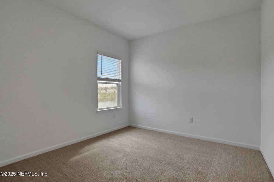 Spacious, unfurnished interior of a new home in TrailMark, St. Augustine (Image 30).