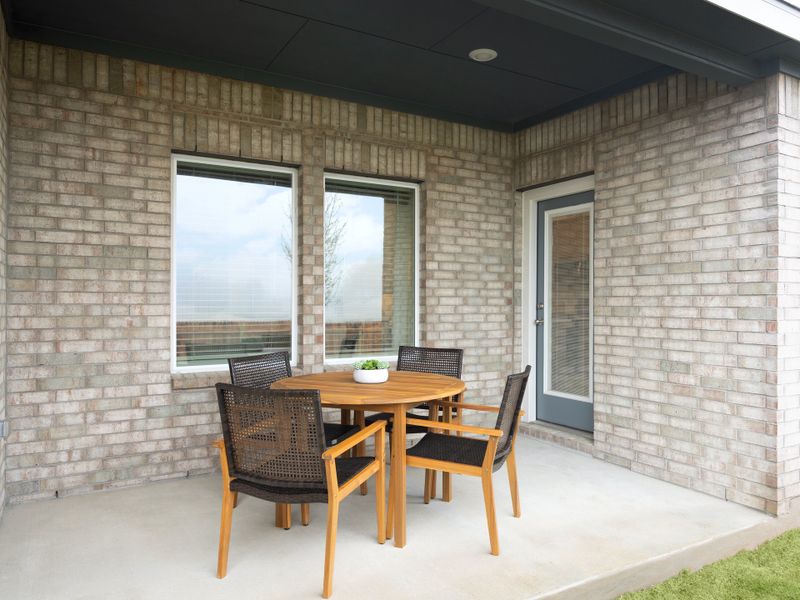 Exterior details and patio area of a home in Colony at Cole Springs - Boulevard Collection, Buda (Image 2). Exterior details and patio area of a home in Colony at Cole Springs - Boulevard Collection, Buda (Image 2).