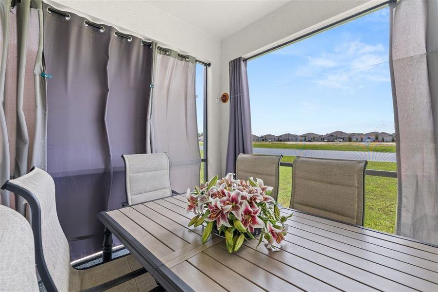 Exterior details and patio area of a home in Lennar at Esplanade, Kissimmee (Image 21). Exterior details and patio area of a home in Lennar at Esplanade, Kissimmee (Image 21).