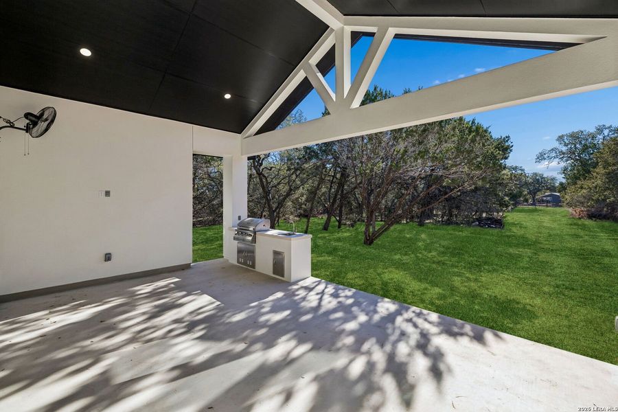 Exterior details and patio area of a home in , Spring Branch (Image 40).