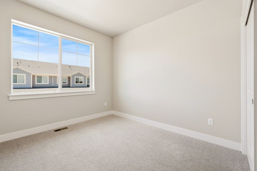 Spacious, unfurnished interior of a new home in The Lakes at Centerra, Loveland (Image 19).