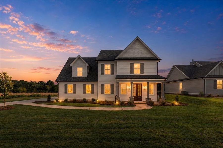 Front exterior of a new home in , Madison, GA, highlighting curb appeal (Image 1). Front exterior of a new home in , Madison, GA, highlighting curb appeal (Image 1).
