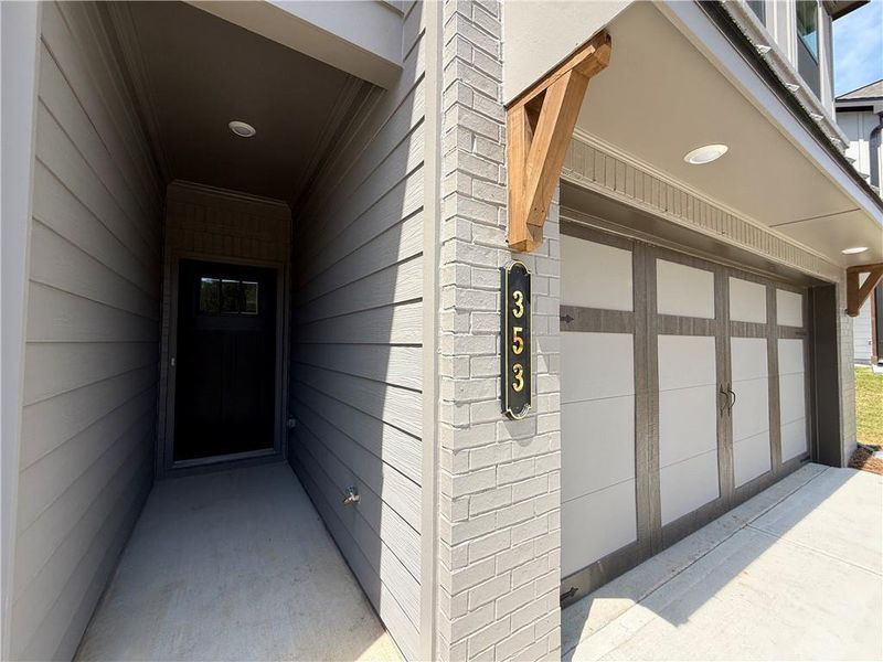 Exterior details and patio area of a home in The Towns at Auburn Station East, Auburn (Image 16).