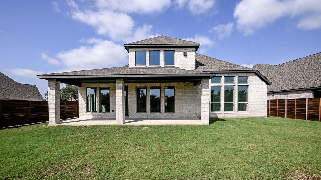 Exterior details and patio area of a home in Juniper Springs, Lockhart (Image 3).