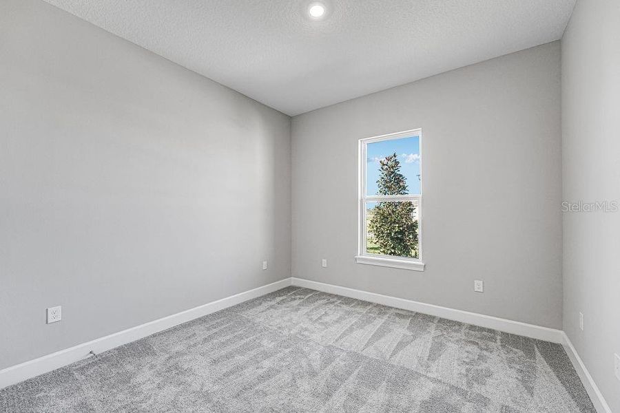 Spacious, unfurnished interior of a new home in Esplanade at Center Lake Ranch, St. Cloud (Image 19).
