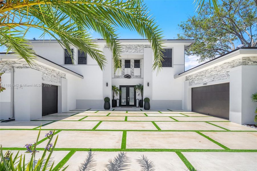 Front exterior of a new home in , Miami, FL, highlighting curb appeal (Image 30). Front exterior of a new home in , Miami, FL, highlighting curb appeal (Image 30).