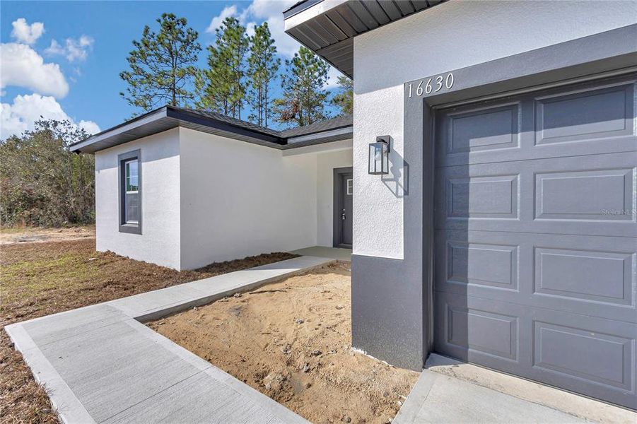 Exterior details and patio area of a home in , Ocala (Image 24).