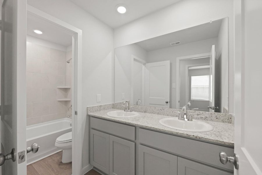 Furnished interior view inside a new home in Sherwood Glen, Conroe (Image 4). Furnished interior view inside a new home in Sherwood Glen, Conroe (Image 4).