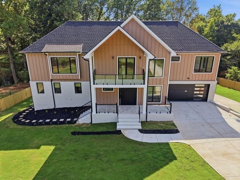 Front exterior of a new home in , Marietta, GA, highlighting curb appeal (Image 33).